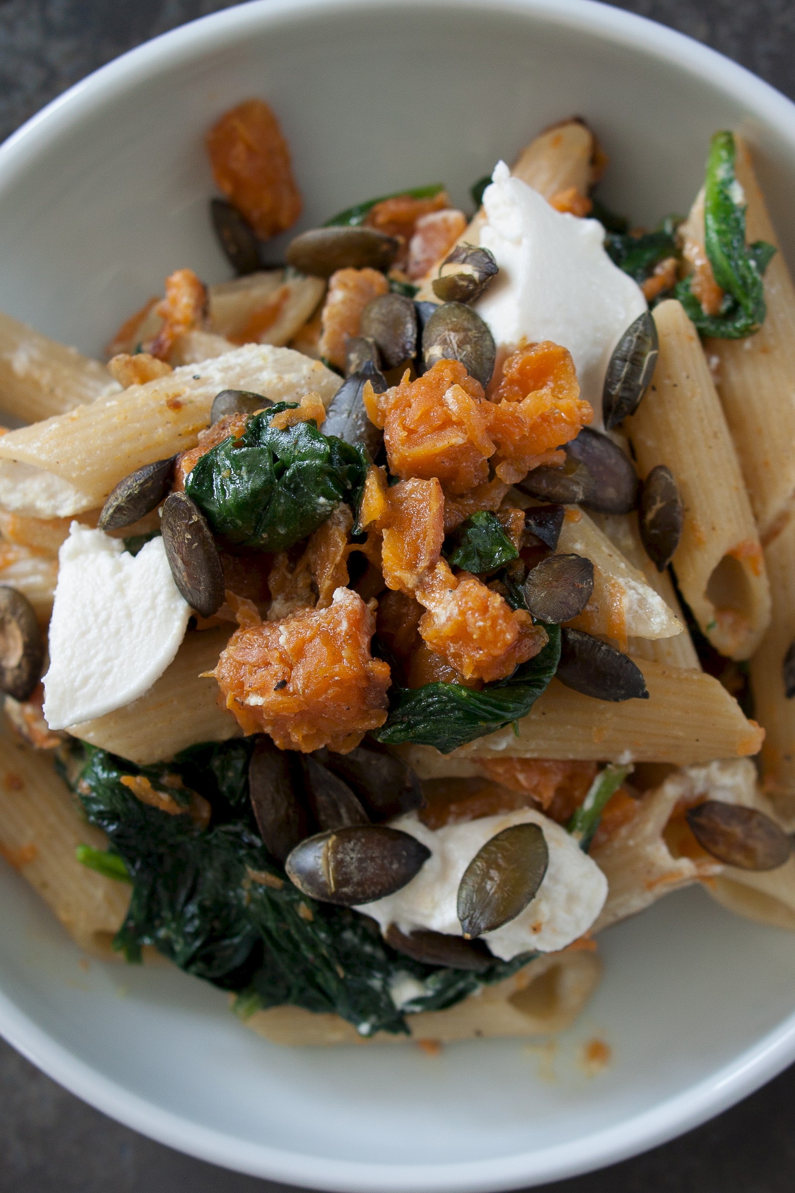 Penne with pumpkin, spinach and ricotta