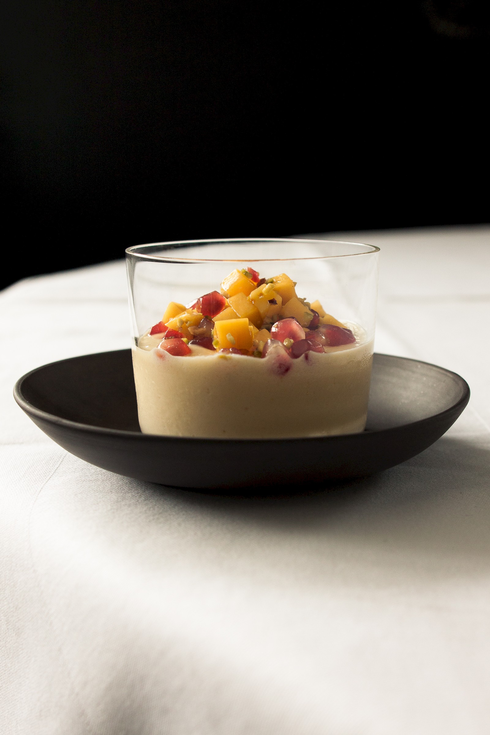 Mango yogurt ricotta cream with pomegranate