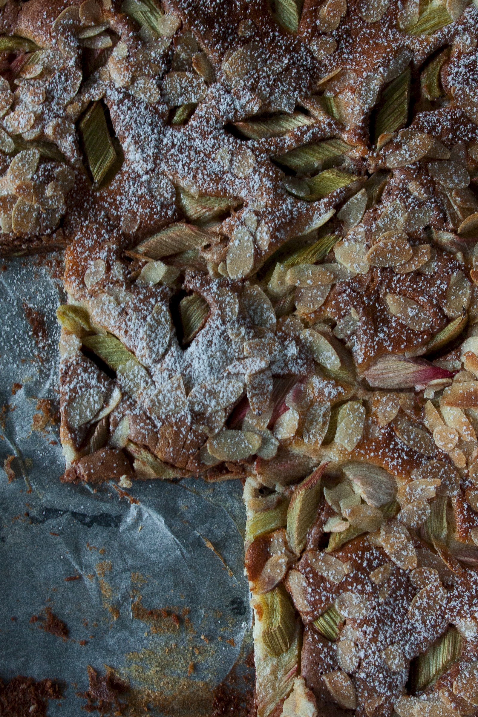 Brownie cheesecake with rhubarb and almonds