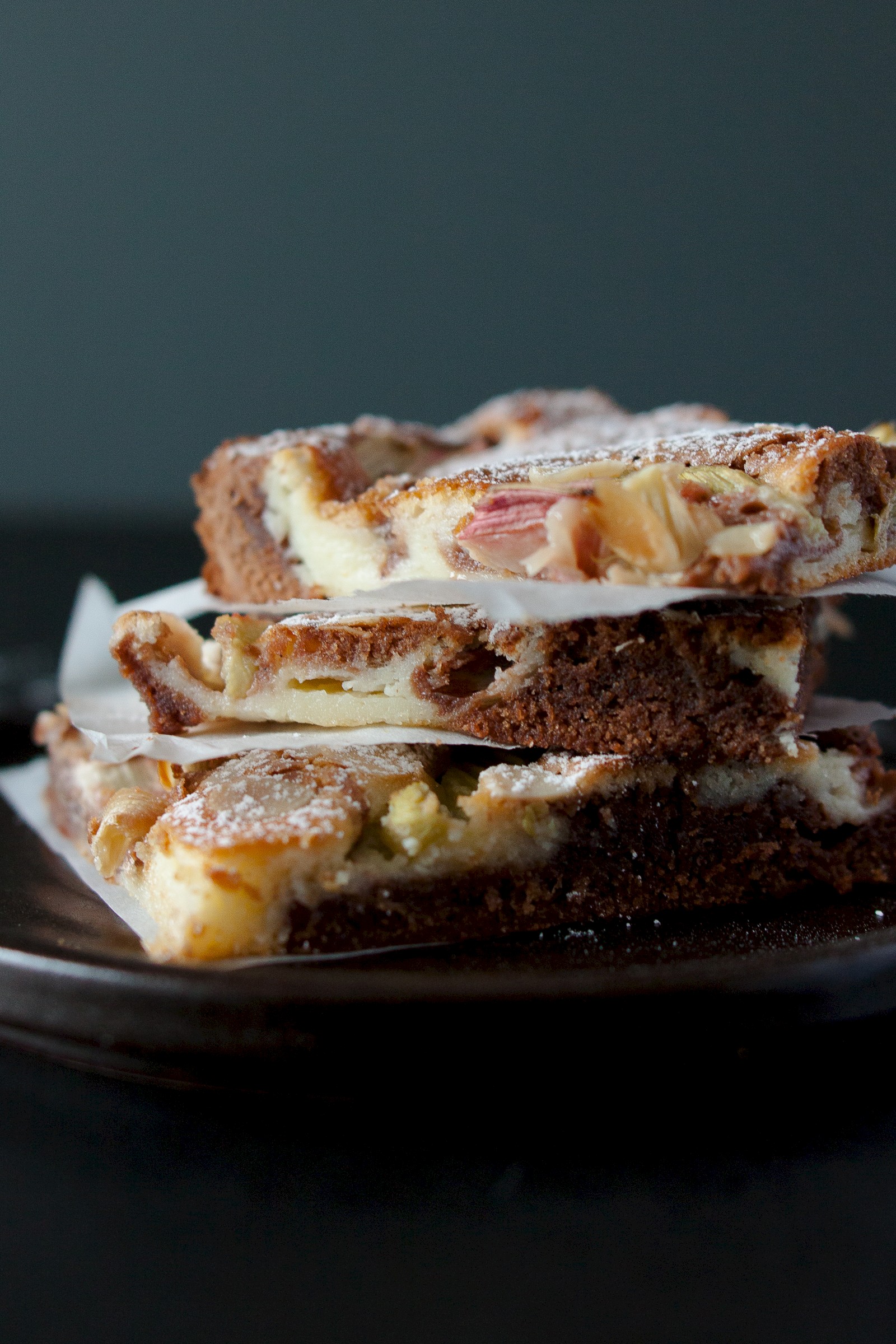 Brownie cheesecake with rhubarb and almonds