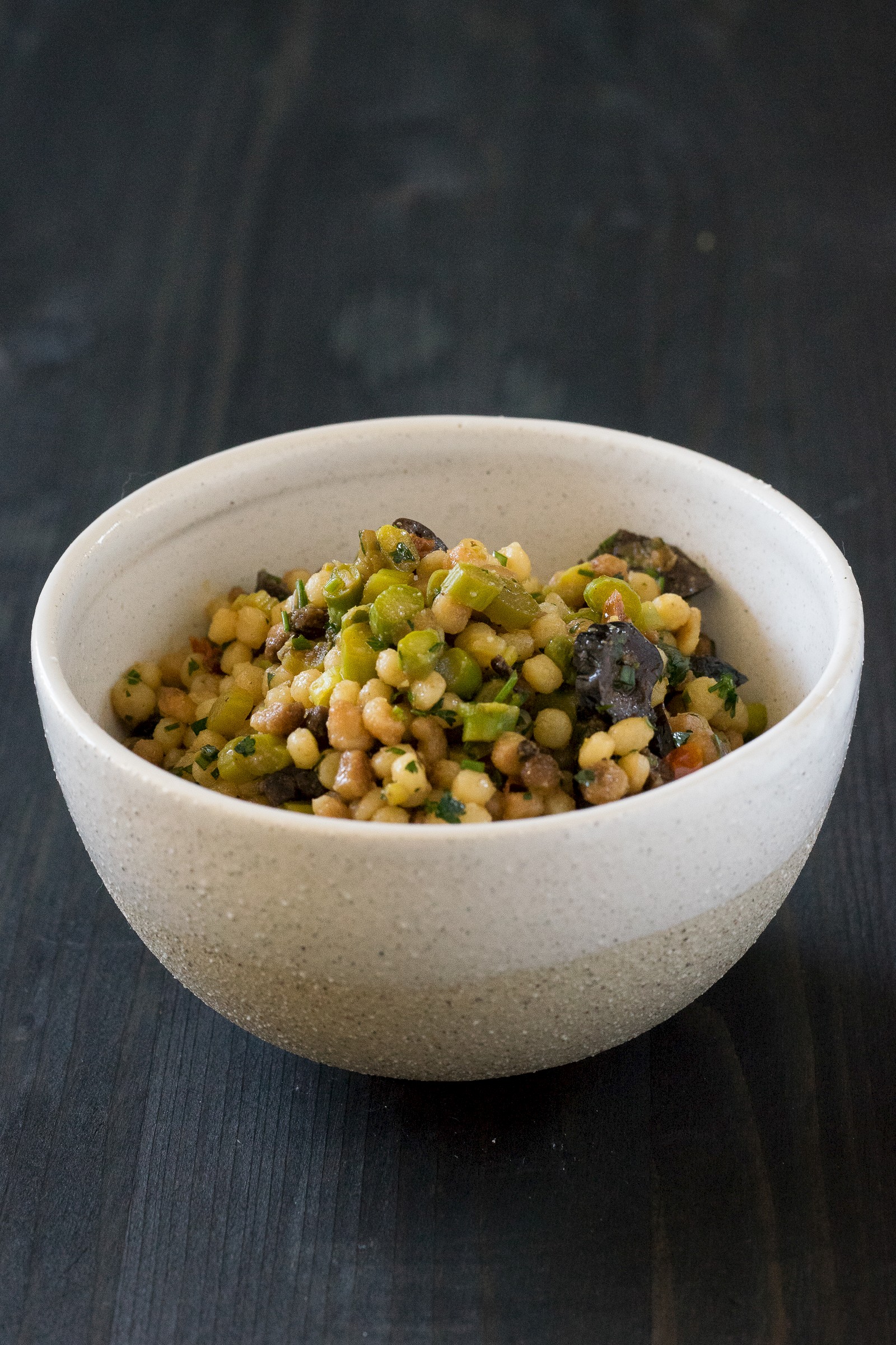 Fregola sarda with aspargus, olives, herbs and lemon dressing