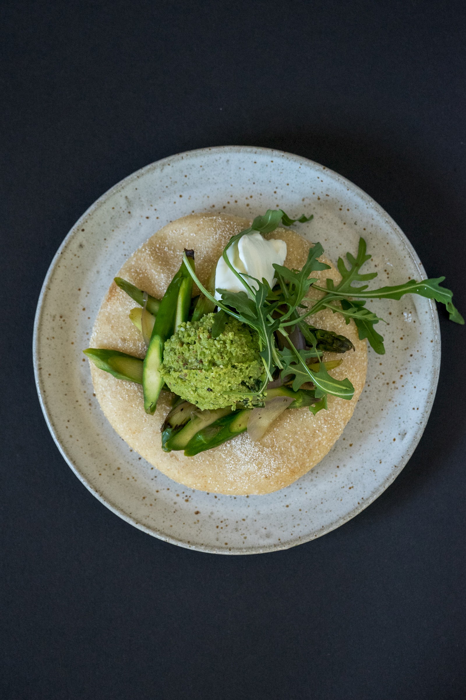 Aspargus, pea pesto and greek yogurt on pitta bread