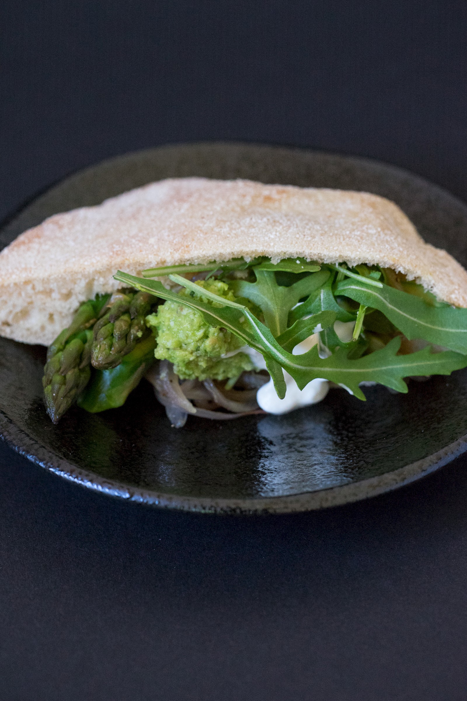 Aspargus, pea pesto and greek yogurt on pitta bread