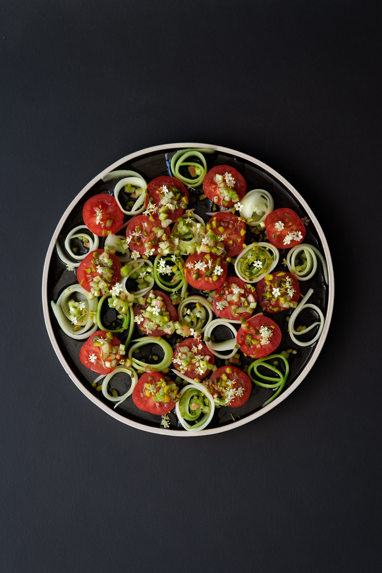 Tomato salad with cucumber, rhubarb and elderflower