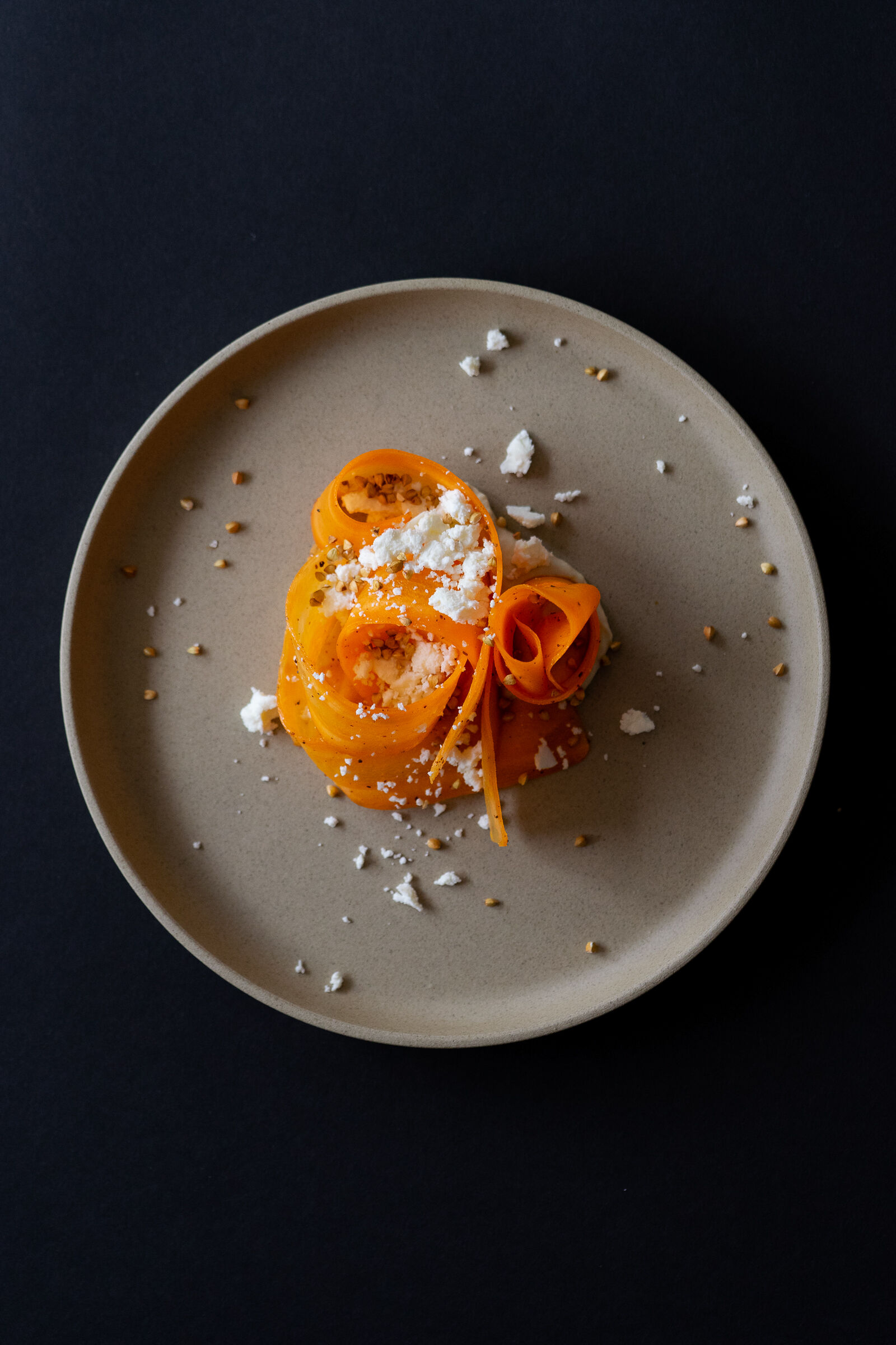 Bean hummus with carrot, sumac, feta and buckwheat