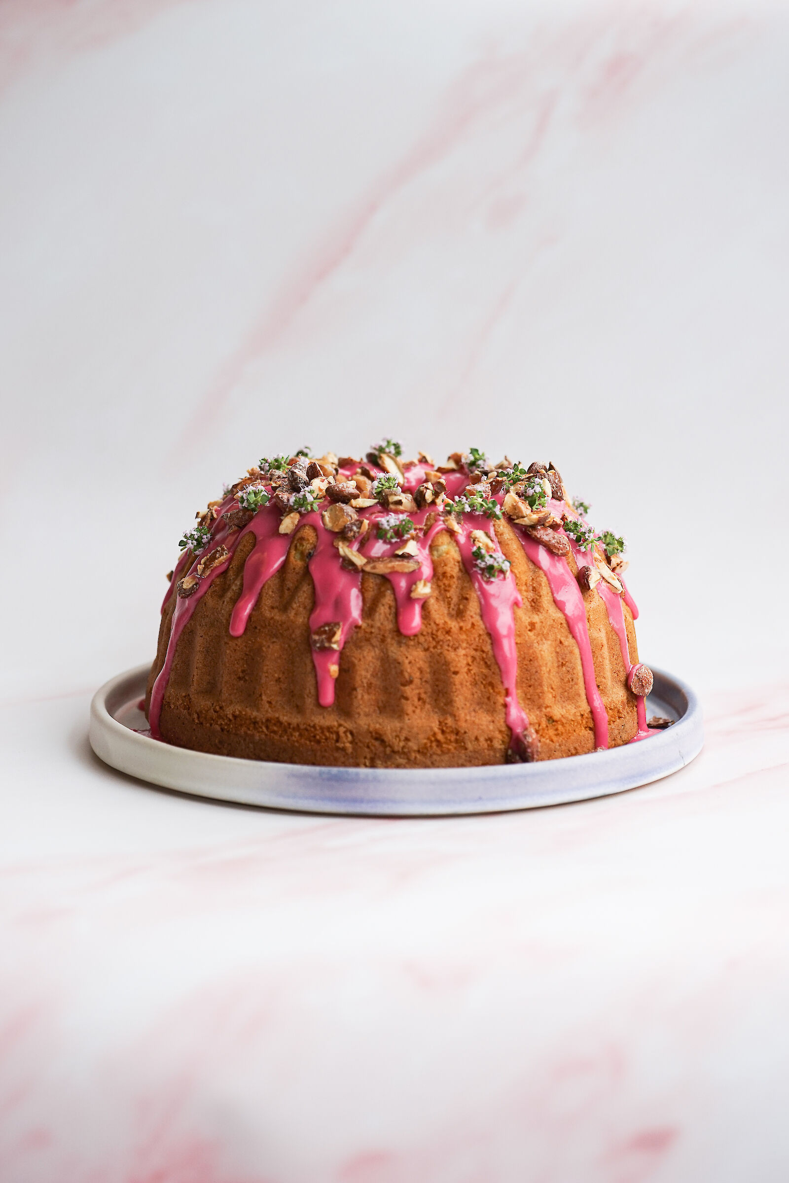 Rhubarb gugelhopf with olive oil, thyme and almonds