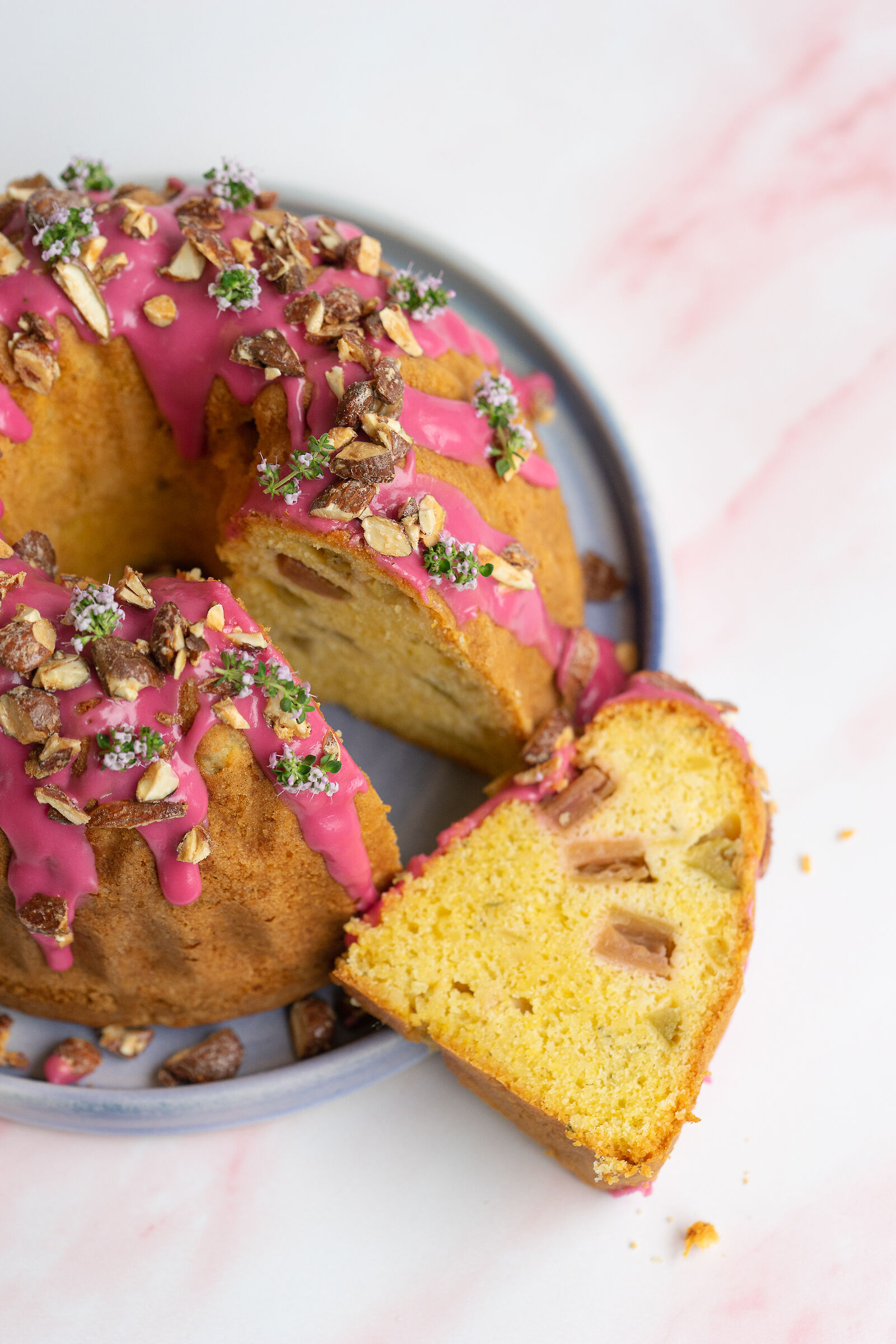 Rhubarb gugelhopf with olive oil, thyme and almonds