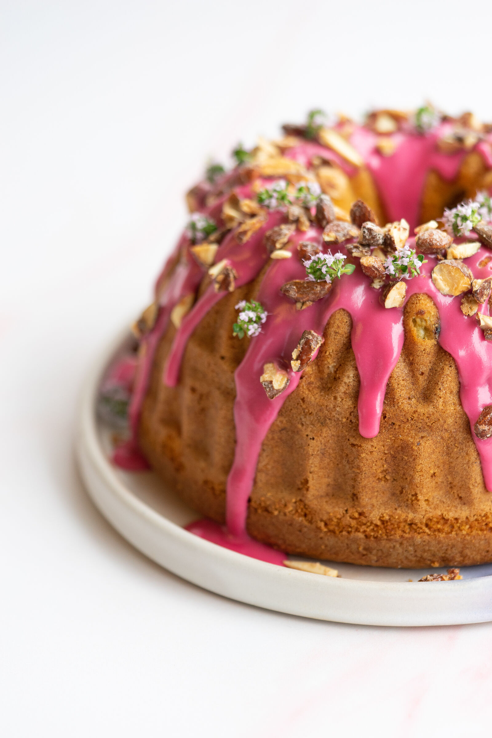 Rhubarb gugelhopf with olive oil, thyme and almonds