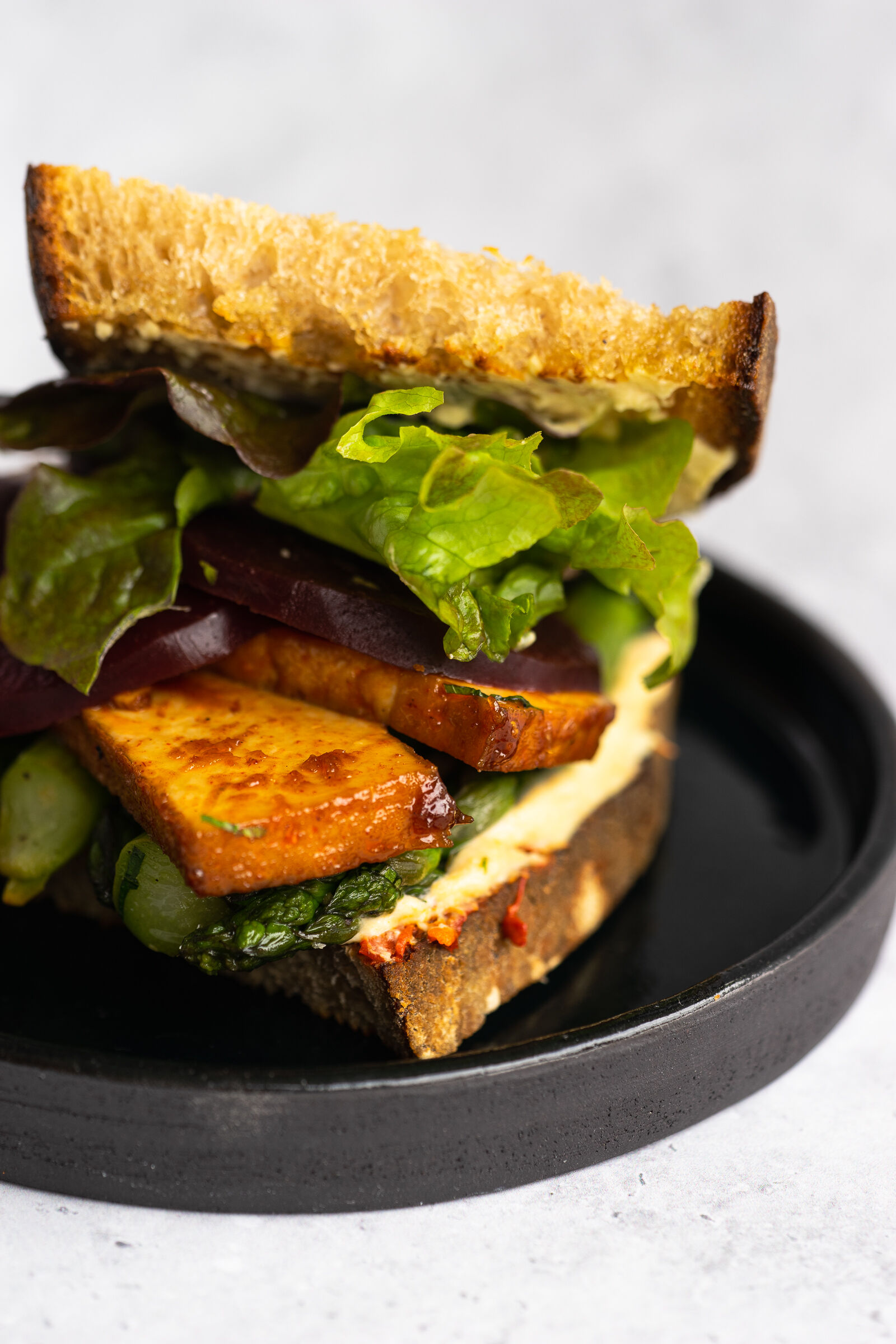 Club sandwich with tofu and asparagus