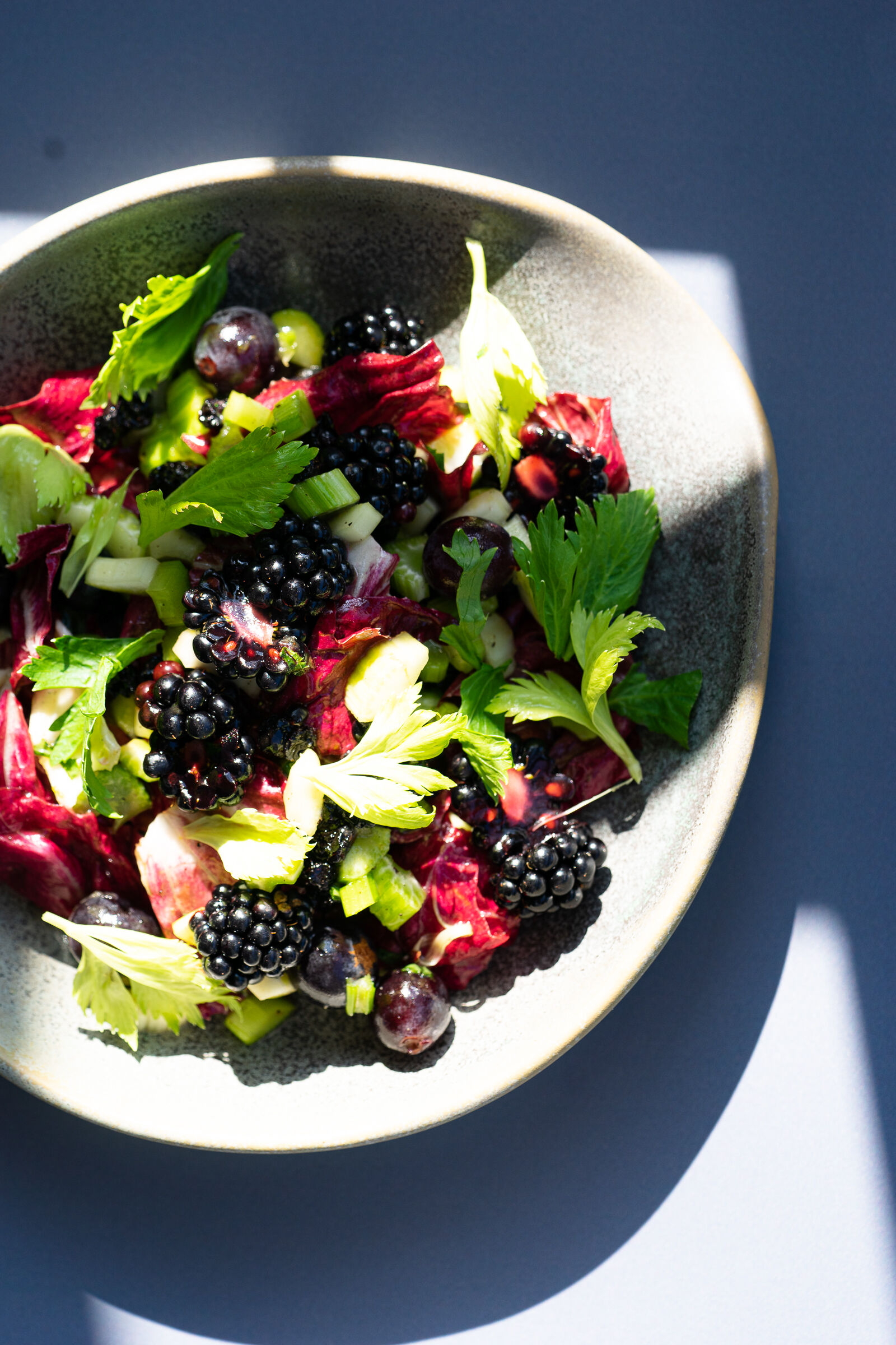Celery salad with blackberries, grapes and Cicorino rosso