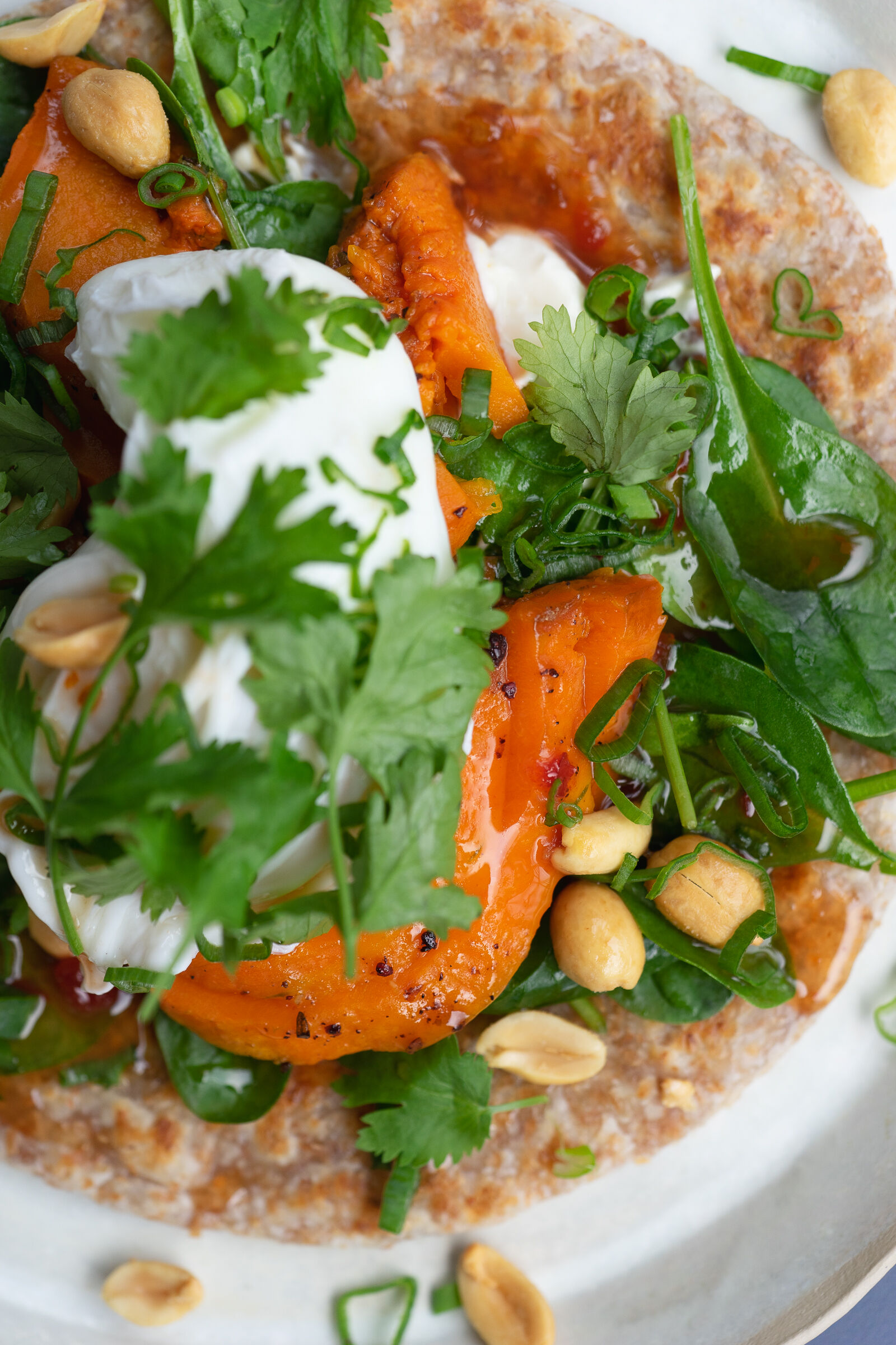 Roti with pumpkin, spinach, egg and chilli sauce